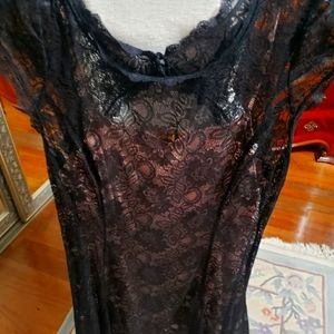 Beautiful black lace dress with cream colored shell underneath